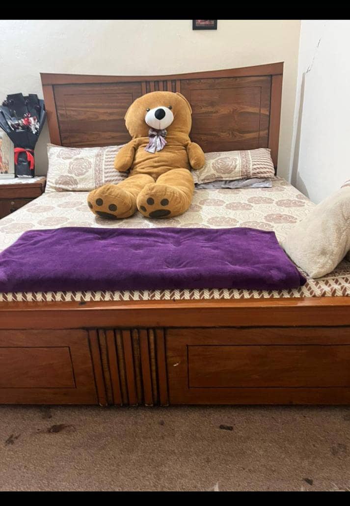 bed with side table 0