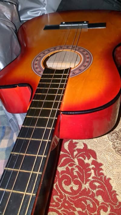 acoustic beginner wooden guitar