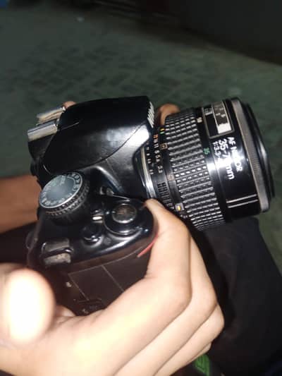 nikon D3000 with Af nikon 35-70mm lens