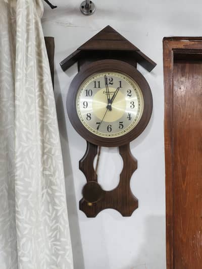Stylish Wooden Wall Clock with Pendulum – Excellent Condition