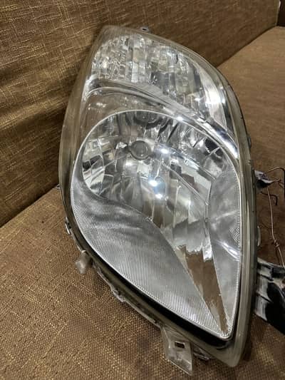 i want to sell my vitz 2006 Head lights