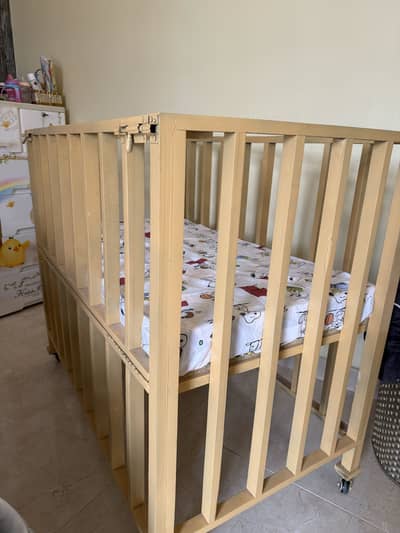 Wooden baby cot