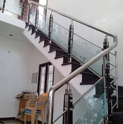 STAIRS RAILING AND TERRACE IN GLASS AND STAINLESS AND STEEL