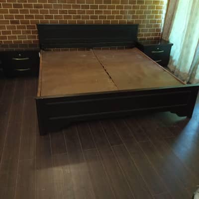wooden black queen bed with side drawer with glass top