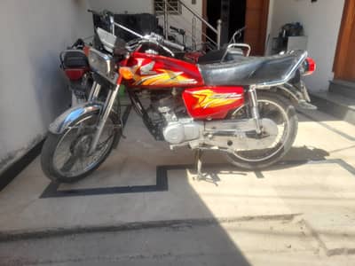 honda 125 . good condition . . . 2021 model . islamabad num