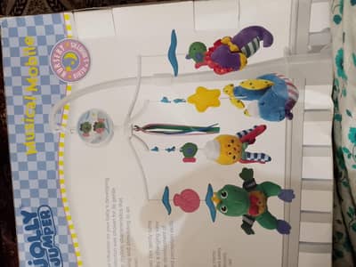 musical toy, jolly jumper, glows in the Dark,