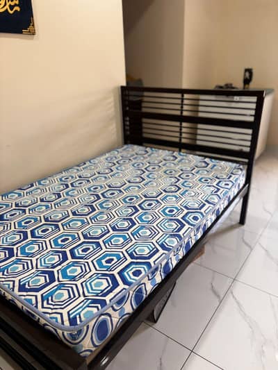 2 single beds with mattress