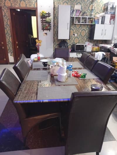 8 seater dining table available for sale