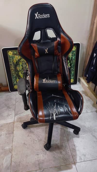 x rocker gaming chair. damaged