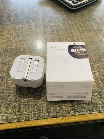 Iphone origional adapter from KSA box pack pieces