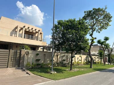 One Kanal Lash Green Lawn + One Kanal Ultra-Modern Design Most Beautiful Full Basement Bungalow For Sale At Prime Location Of DHA Lahore Near To Park Masjid &Amp; Commercial Market.