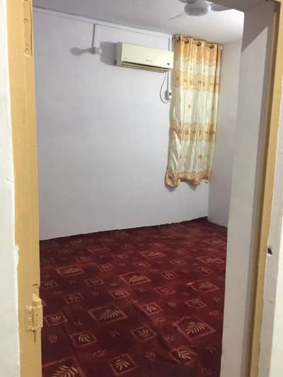Semi Furnished Independent Flat/ Apartment with 2 Rooms for Rent in Q Block Model Town Lahore with AC, Mini Room Fridge, Curtain, Bed, Kitchen & bath room Rent = 28000