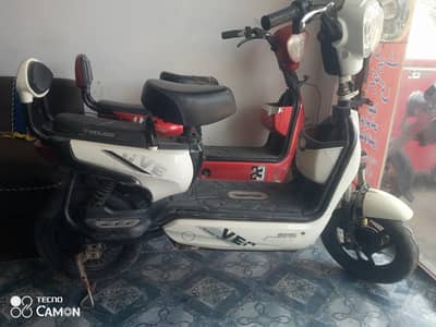 350:wat elctric evee scooty  runninging me he