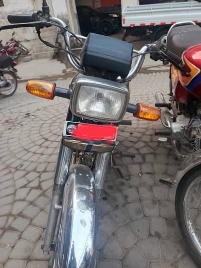 Metro 70cc red colour