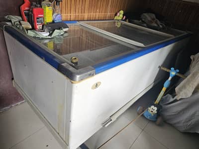 3 meter long chest freezer with 3 sliding glass doors.