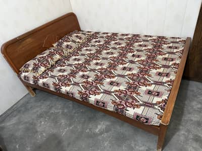 Double bed (wooden) for sale. (mattress is not included)