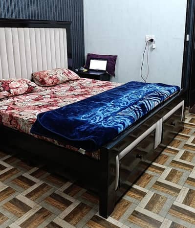 wooden bed heavy