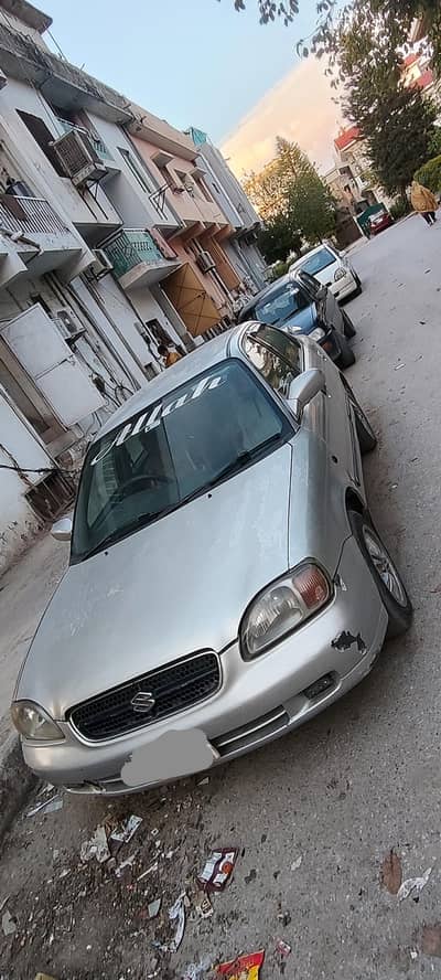 Suzuki baleno jxr 2004 model silver Islamabad registered