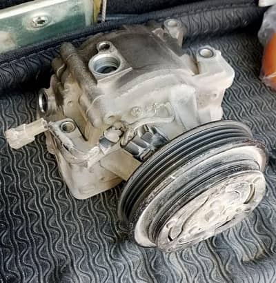 car ac compressor 1300cc Corolla gli.