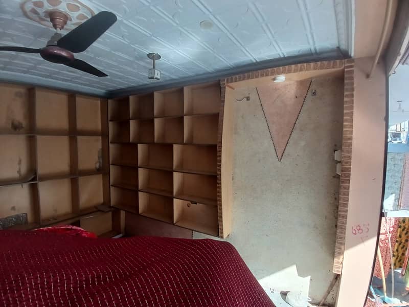 کپڑوں کی الماری ساتھ2 کونٹر  2دوکانوں کاسٹ آپ ہے ہ 13