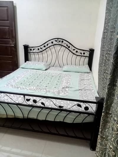 iron bed and dressing with side table