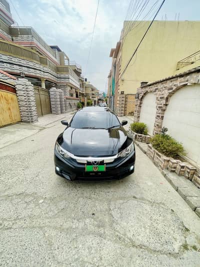 Honda Civic Oriel vti 1.8 prosmatic 1st owner bumper to bumper