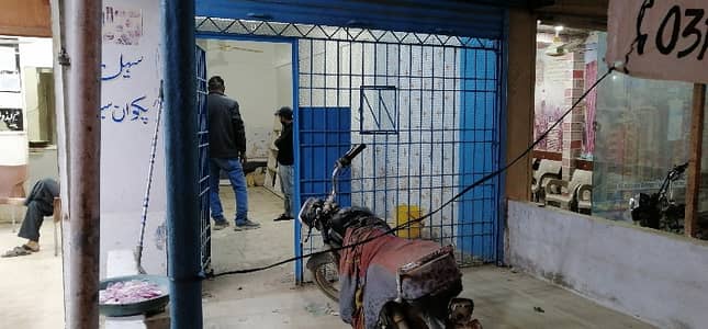 Shop For Rent With Attached Bath Size 11 X 40 200 Feet Main Road Facing Extra Land Prime Location North Karachi Sector 11A Near Power House Chowrangi