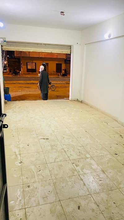 Shop Corner size 11/40 with attached bath 200 road facing ideal location north karchi sector 11A near power house chowrangi