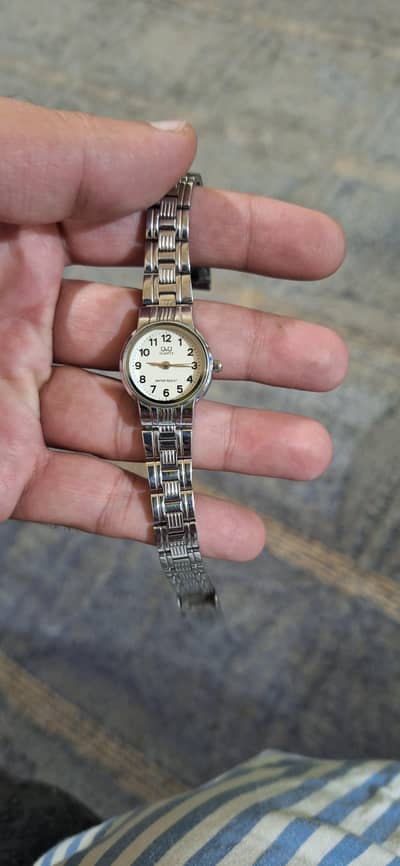 Omax and Quartz original watch