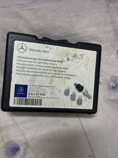 Mercedes genuine wheel locking lugs