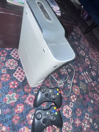 Xbox 360 with two controllers 50 plus games