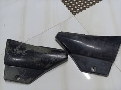 70 side cover pair in good condition