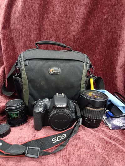 Canon 200D with 2 lenses, bag and cleaning kit,