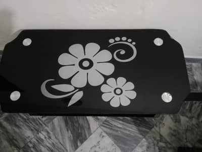 Used black Glass Table with flowers design |lower shelf|Good condition