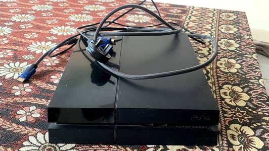 Ps4 Fat 500GB with 2 controllers and 2 games