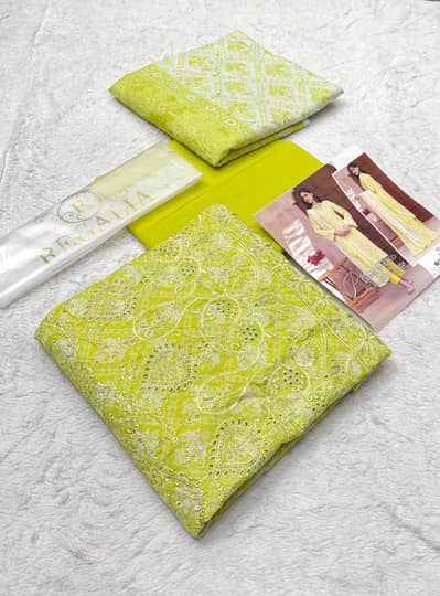 Original 3 pieces Emborided Printed Lawn Collection.