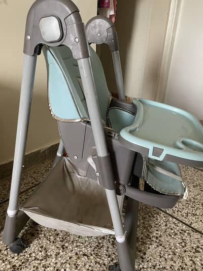 Baby high chair with tray . Good condition