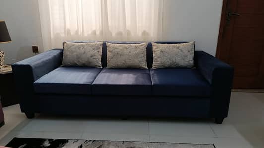 3 seater  velvet sofa  with cushion .