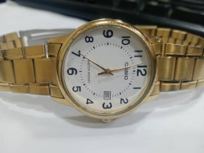 Casio MTP-V002G-7B2 Analog Quartz watch Golden watch for men