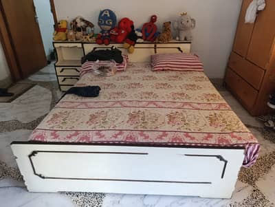 One double bed with two side tables