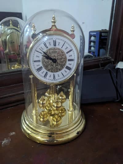 German table clock and D&G watch