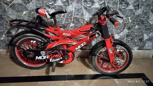 Morgan RED Bicycle for 7 to 9 years old Kids with pair of side wheels.