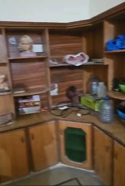 built-in wooden kitchen cupboard