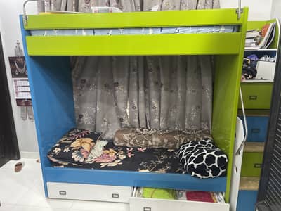 Bunk bed with stairs and mattresses