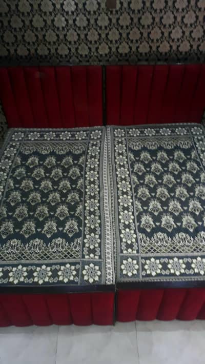 Two single bads with matters and side table