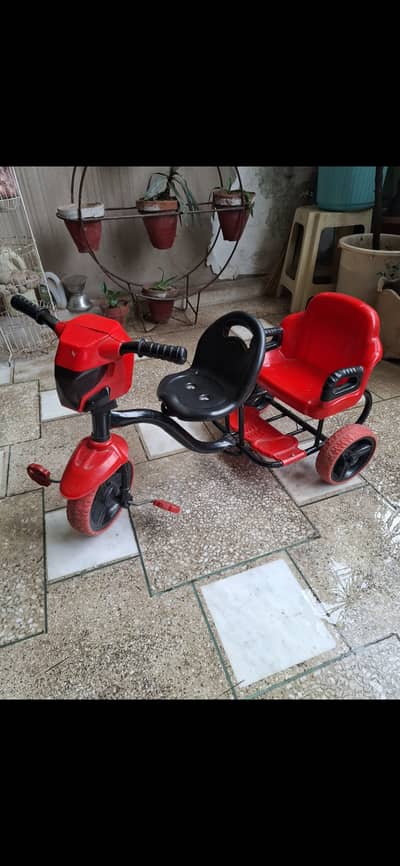 Kids double seat tricycle. Condition like new. High quality material