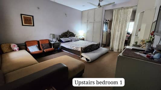 10 Marla Double-Story House for Sale in M Block Model Town Lahore