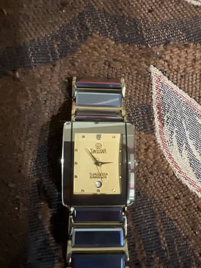Swistar watch 23 carat gold plated bohat achi quality ha