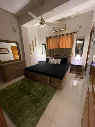 2 bedrooms apartment fully luxury furnished available for rent location E-11 Islamabad prime location