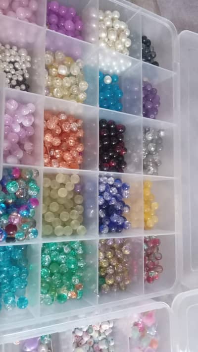 bracelet making stons  and thread . and all tools